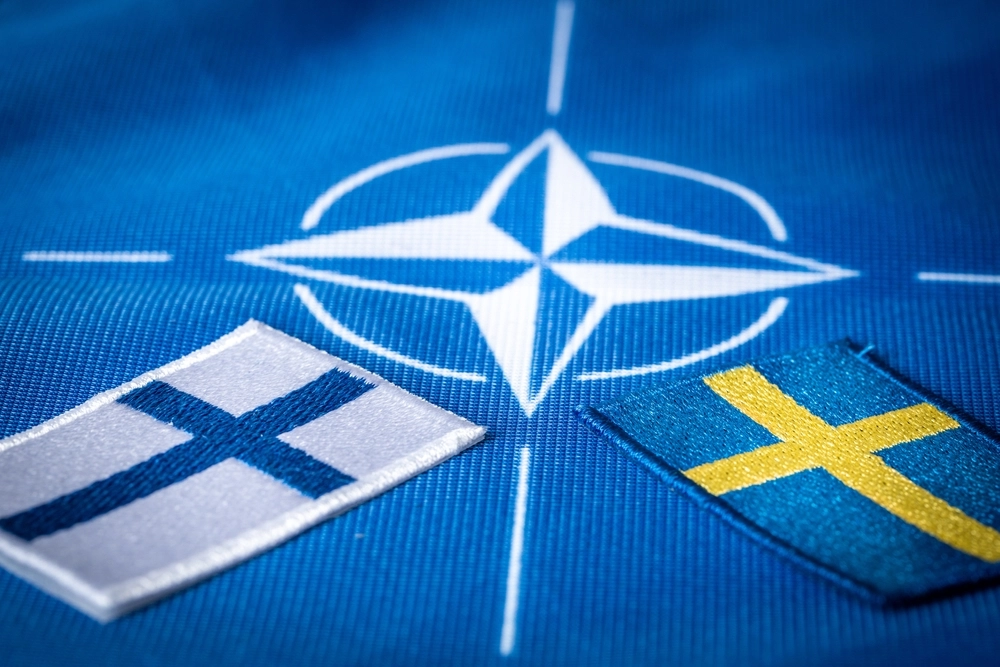 Sverige, Flags,Of,Sweden,And,Finland,Against,The,Background,Of,The