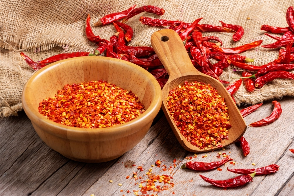 Cayenne,Peppers,In,A,Wooden,Bowl,Dried