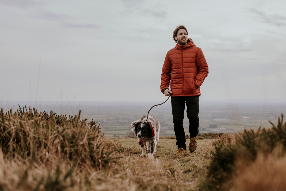 Male with dog walking