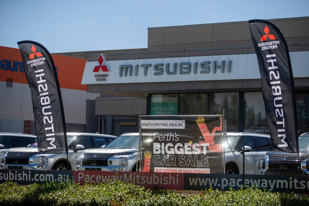 Perth,Australia,2024-03-18,Mitsubishi,Motors,Dealership,Exterior,Featuring,Promotional,Banners