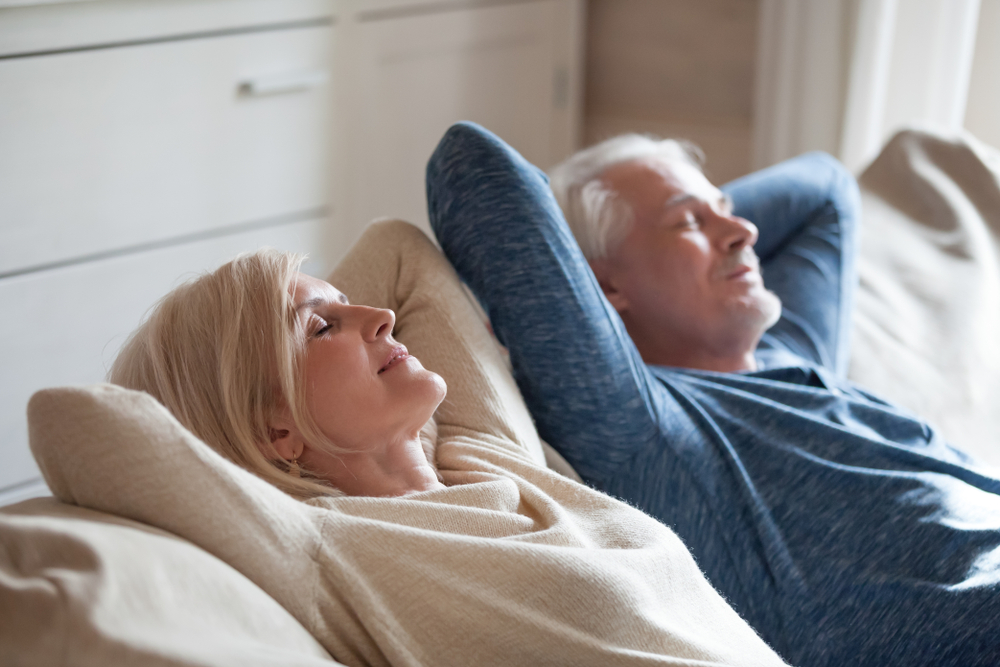 Calm,Senior,Couple,Relaxing,Sofa,
