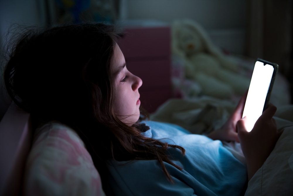 Phone,Lying,In,Bed