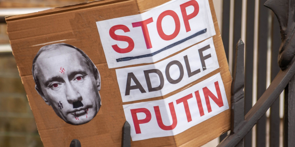 STOP ADOLF PUTIN placard outside Downing Street at a Rally for Ukraine