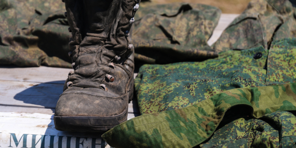 Boots and clothes of the Russian army, found after the fighting during the Russian-Ukrainian war