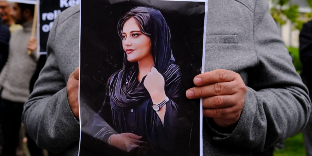 Protestors take part during a demonstration in front of the Iranian embassy in Brussels, Belgium on Sept. 23, 2022, following the death of Mahsa Amini.