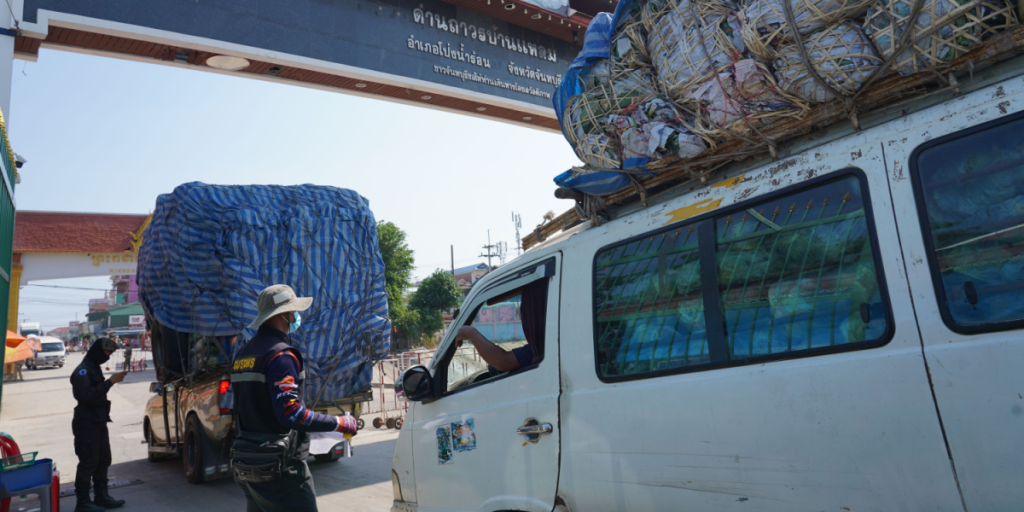 Migrant workers are loading and unloading consumer goods at Ban Laem Market through the Thai-Cambodian border checkpoint in Chanthaburi Province