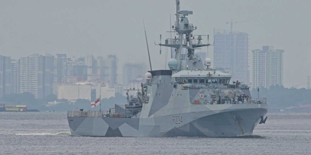 Royal Navy HMS Spey (P234) , a River-class offshore patrol vessel transiting Johor Straits.