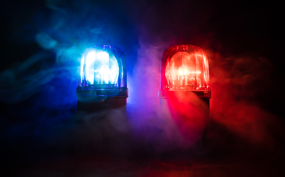 Police,Car,Blue,And,Red,Round,Vintage,Siren,In,Dark.