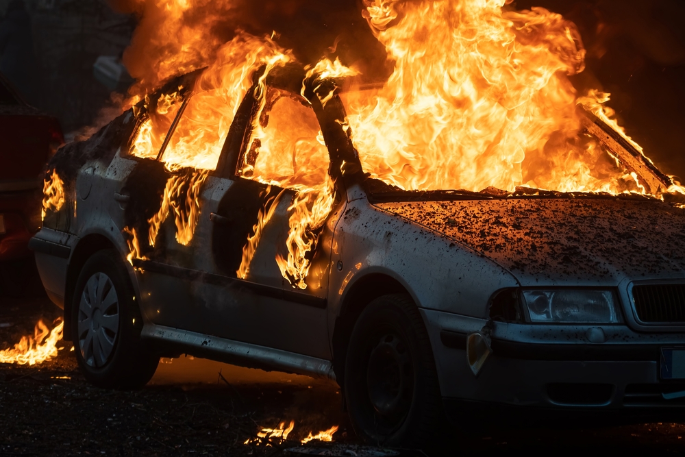 Burning,Car,Close,Up.,Big,Flames,Of,Fire,And,Lots