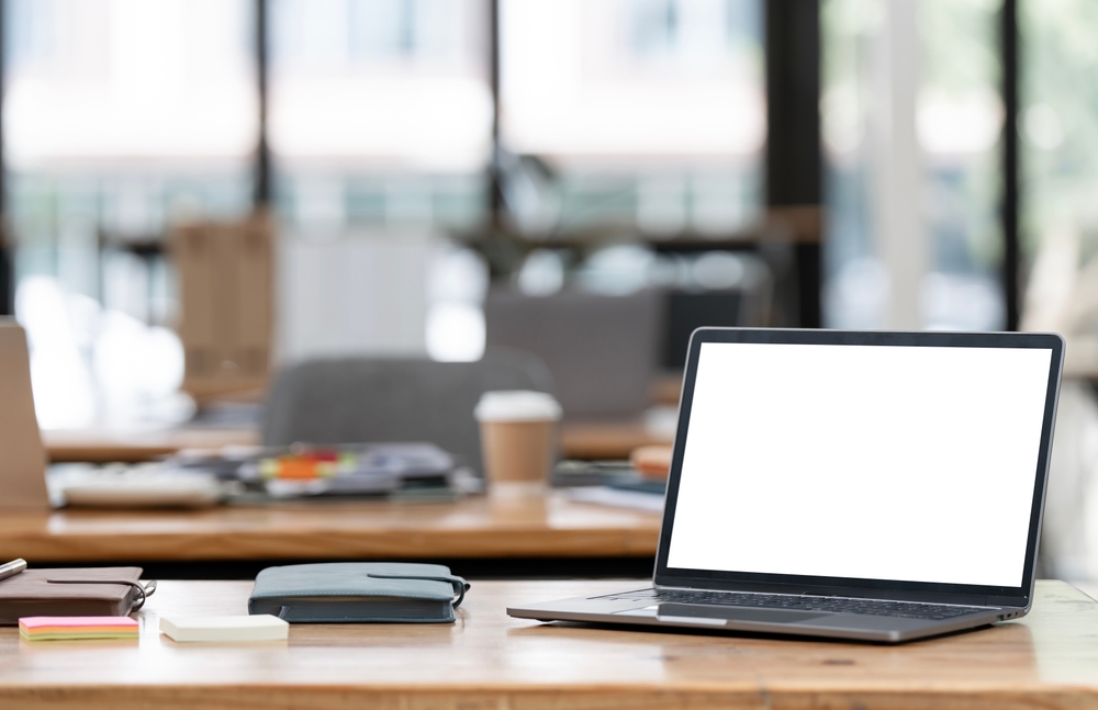 Mockup,Blank,Screen,Laptop,On,Wooden,Table.,Workspace,,Work,From