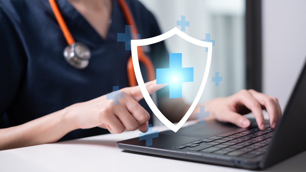 Professional,Healthcare,Medical,Worker,Holding,Health,With,Shield,Icon,Health / Sundhed online
