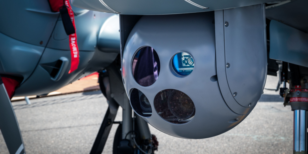 Camera sensor pod under a surveillance aircraft