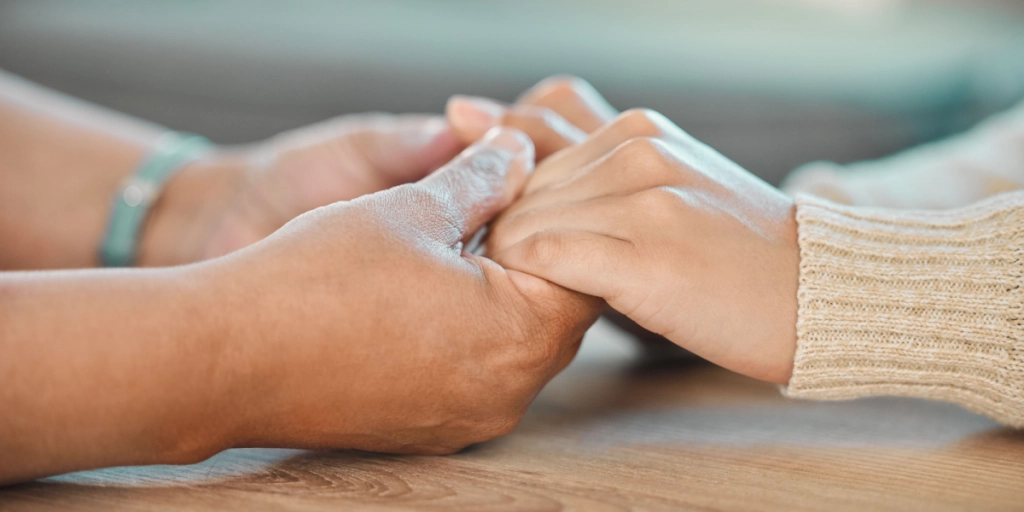 Empathy, holding hands, trauma