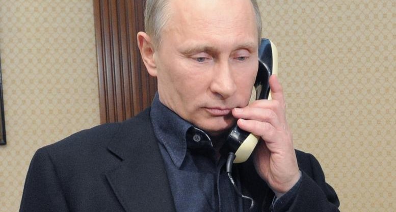Vladimir_Putin_talks_on_a_phone