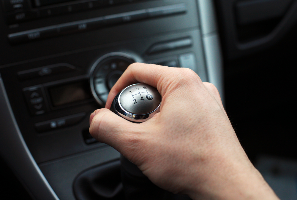 Gearstang, Close,Up,Of,Hand,On,Manual,Gear,Shift,Knob