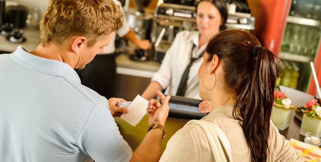 Man,Checking,Receipt,At,Cafe,Restaurant,Payment,Waitress,Couple,Bar