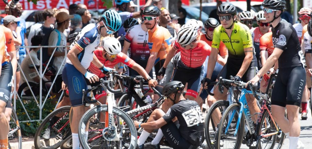 Cyclists recover from a crash in the pro men’s race at the Armed Forces Cycling Classic