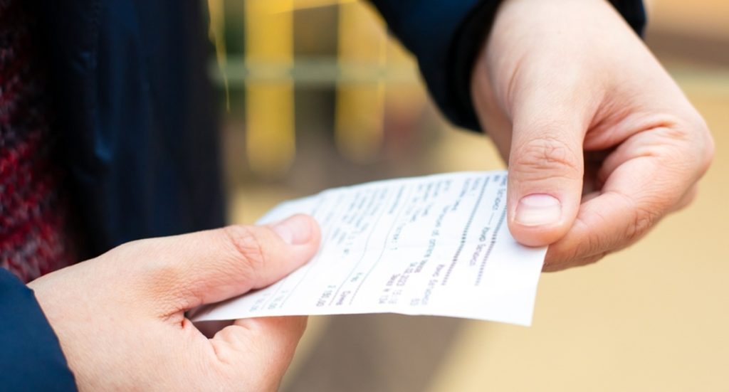 Paper,Grocery,Shopping,Receipt,In,Male,Hands,Close-up.,Blank,Check