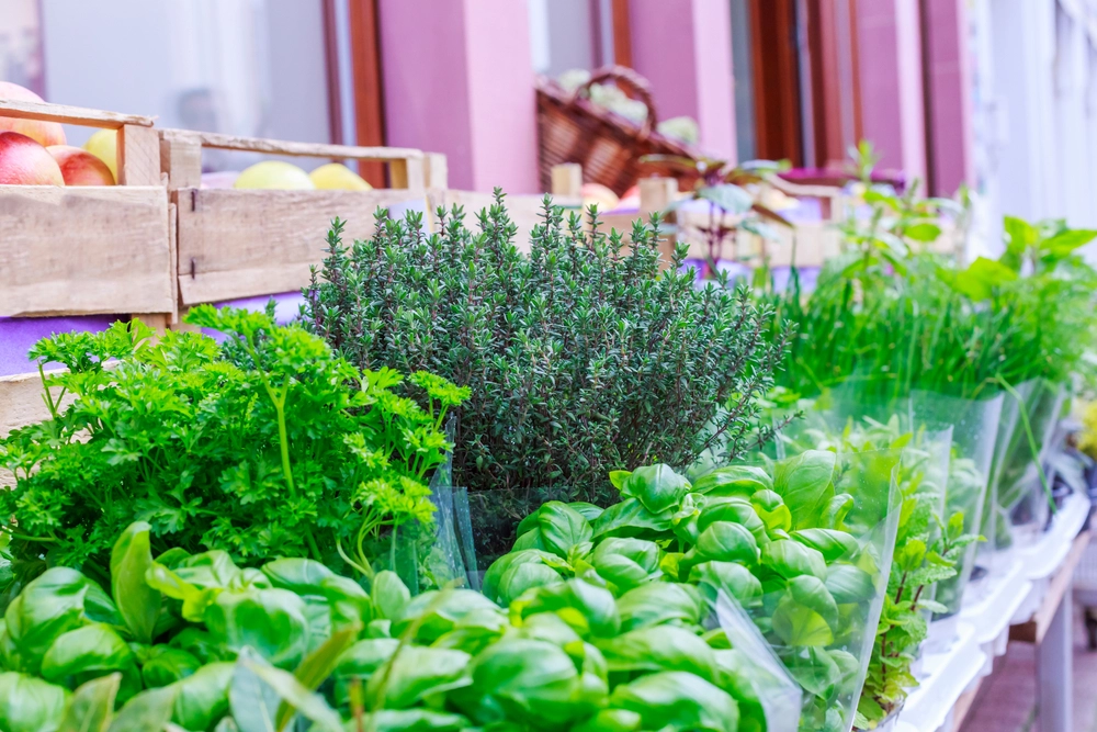 Fresh,Thyme,,Parsley,,Basil,,Vegetables,And,Fruits,On,The,Counter