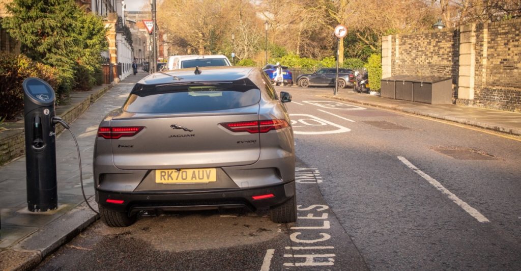 Jaguar I-Pace electric SUV car on charge on residential street, elbil, oplader, EV charging