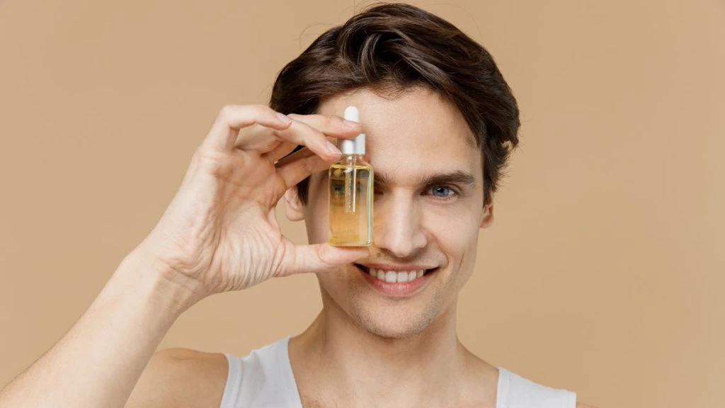 Man with hair oil
