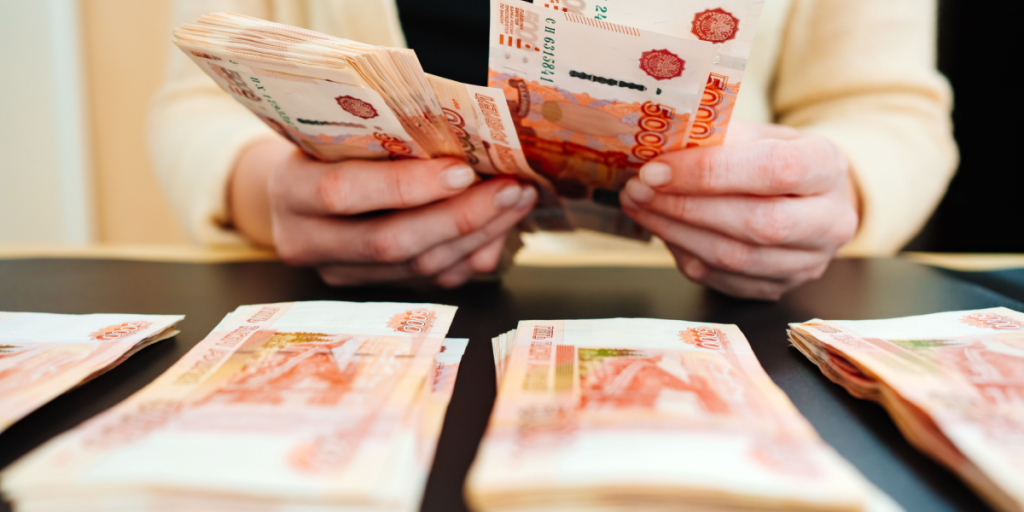 Woman, rubles, counting
