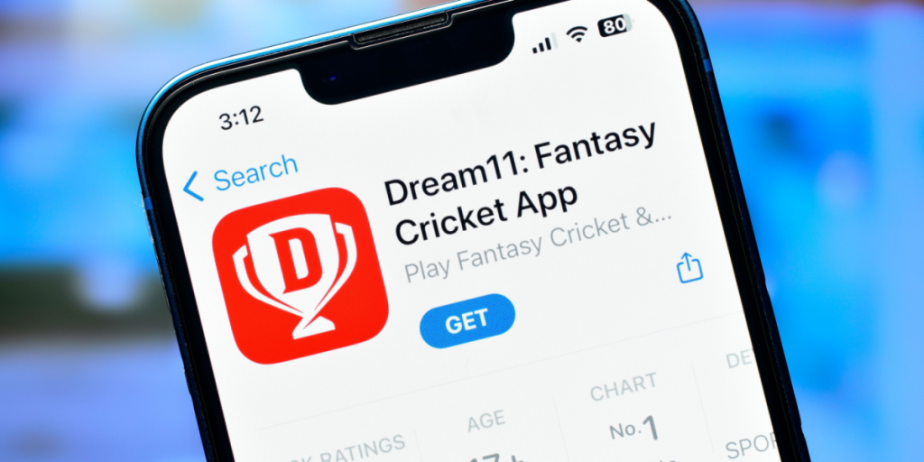 Dream11 fantasy cricket app on smartphone used to betting online on cricket matches