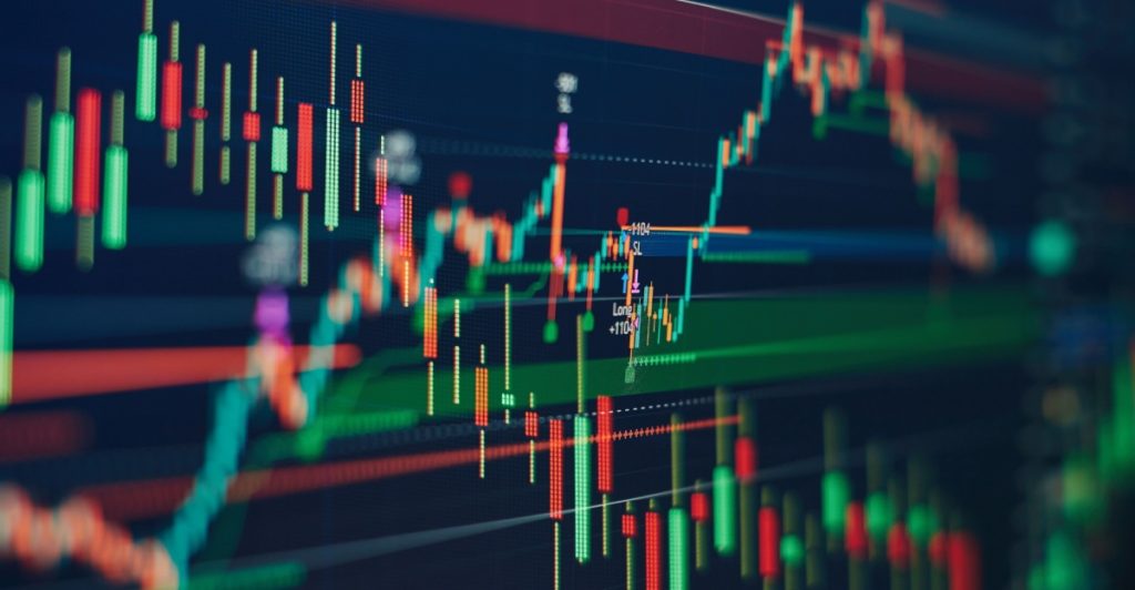 Technical price graph and indicator, red and green candlestick chart on blue theme screen, market volatility, up and down trend. Stock trading, crypto currency, graf op og ned, handel