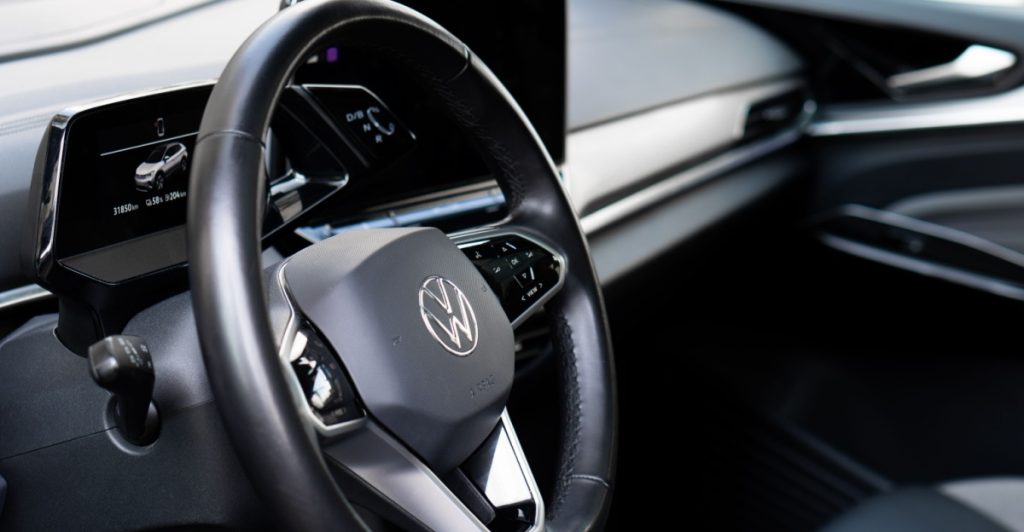 Closeup of an ID.4 steering wheel, highlighting the touch control buttons