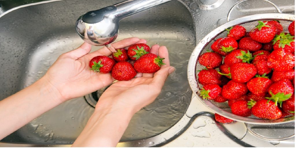 cleaning strawberries
