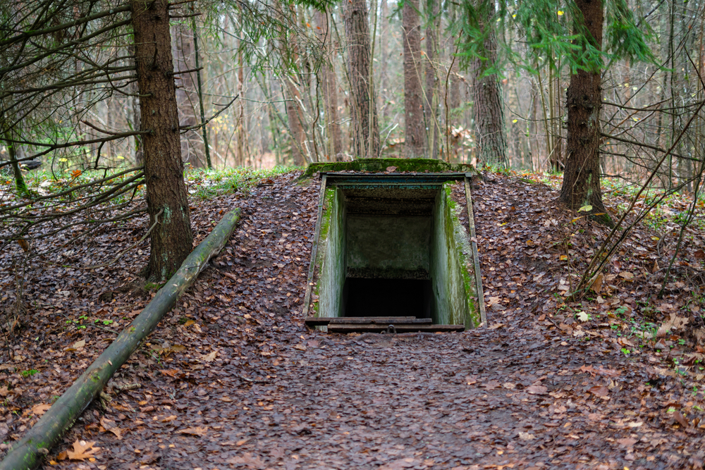 Entrance,To,Underground,Military,Bunker,In,The,Forest.,Former,Concrete