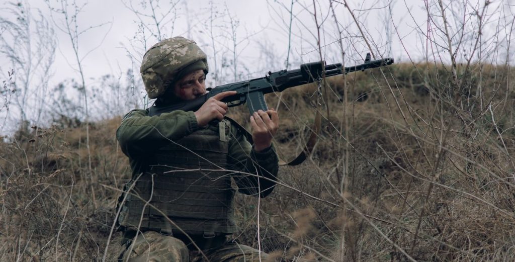 gun riffle Kalashnikov army military frontline soldier