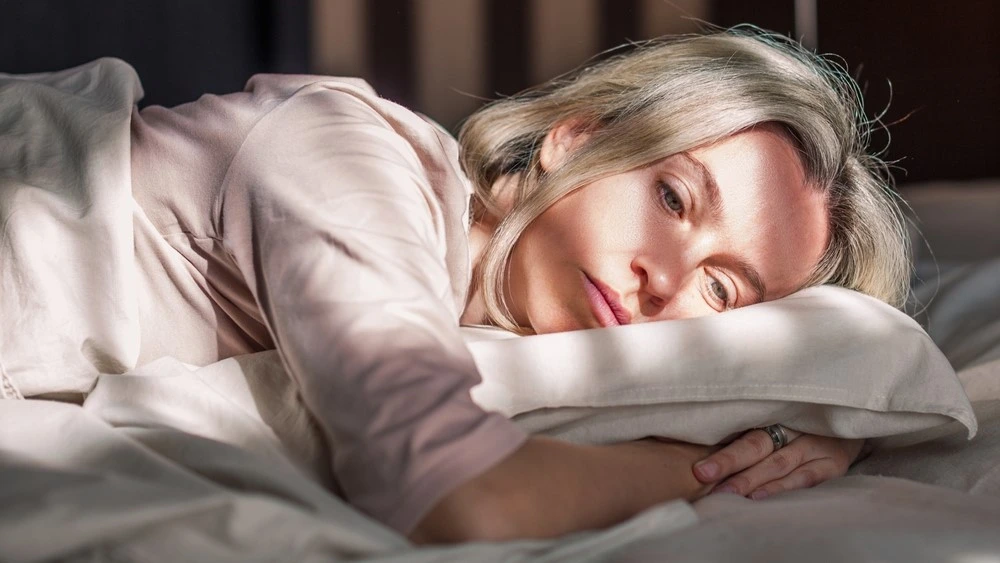 Close,Up,Top,View,Middle-aged,Woman,Lying,Down,In,Bed