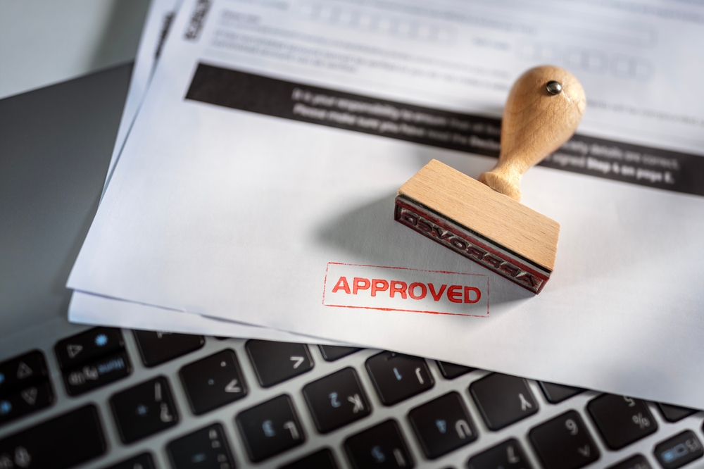 Approved stamp on application form or business agreement document