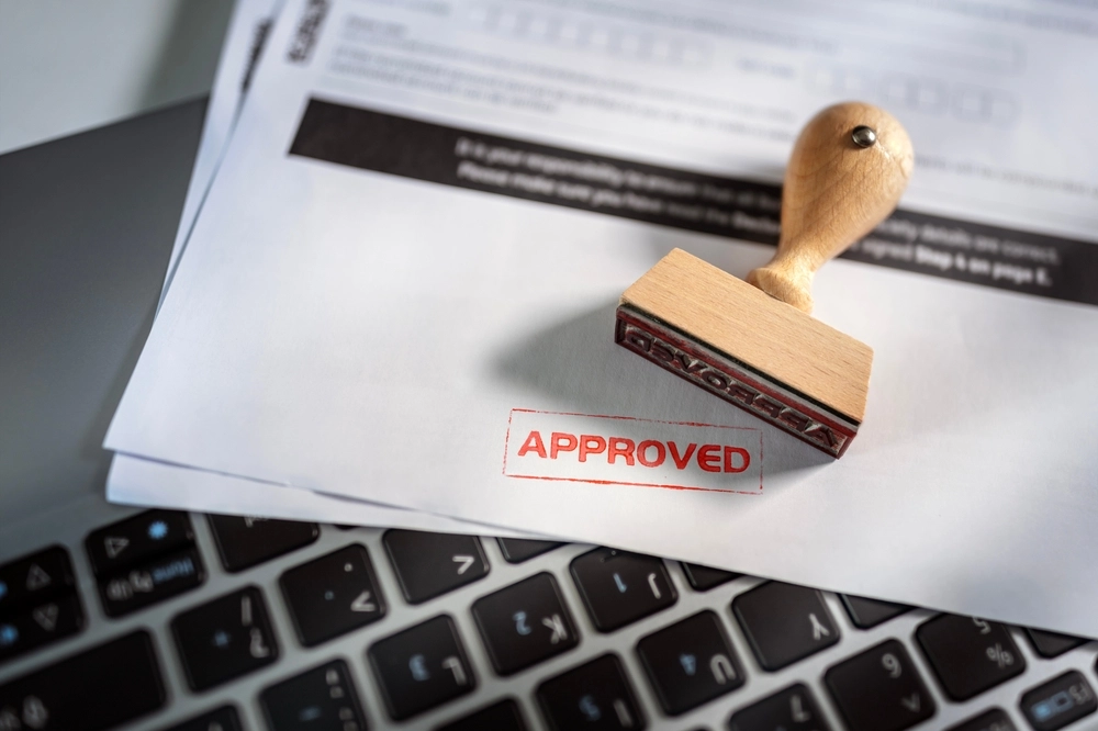 Approved stamp on application form or business agreement document