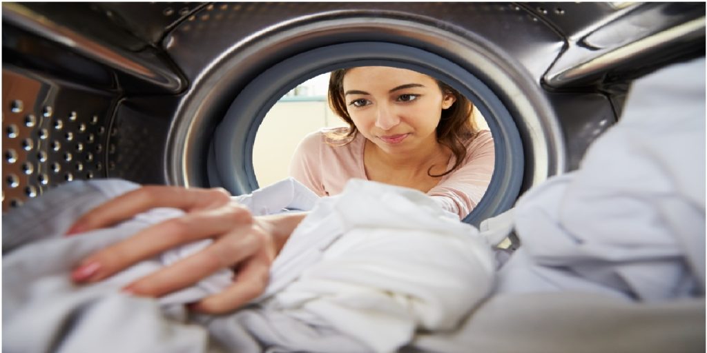 woman drying clothes