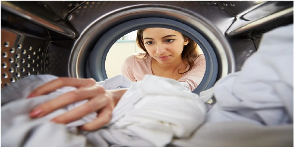 woman drying clothes