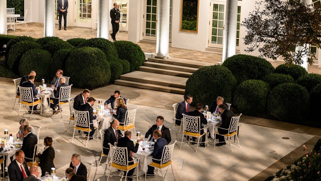 President Donald Trump hosts a dinner in the newly renovated White House Rose Garden