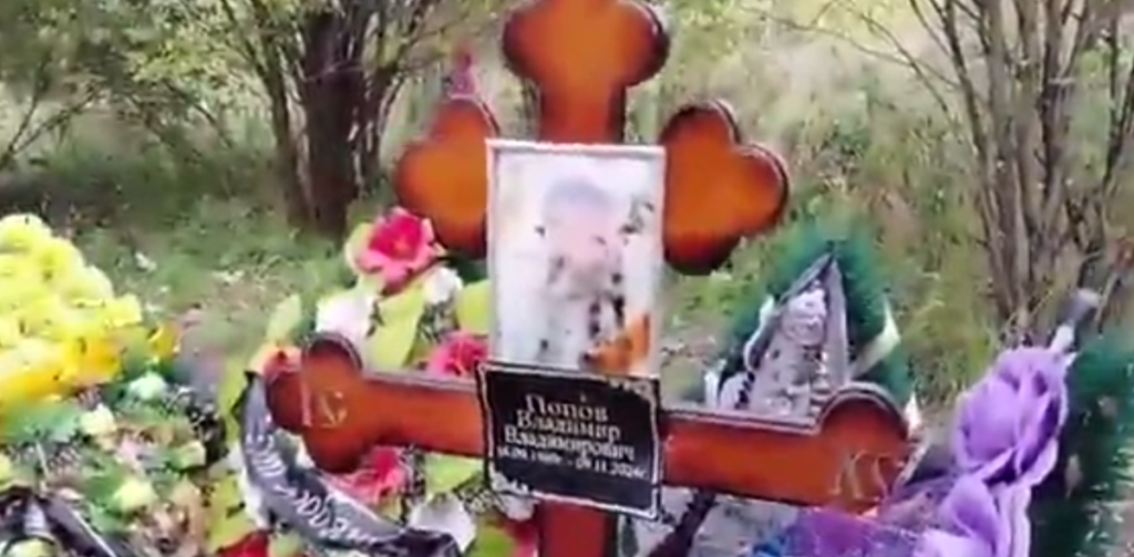 russia soldier funeral burial grave