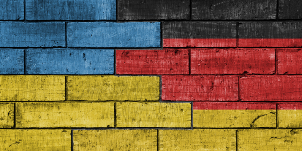 Ukraine, Germany, flags, brick wall