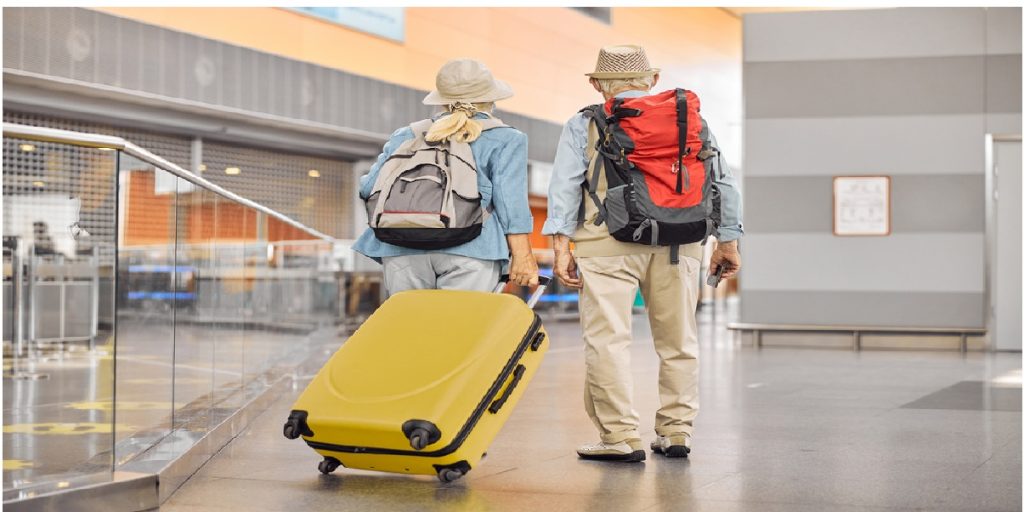 old couple travelling