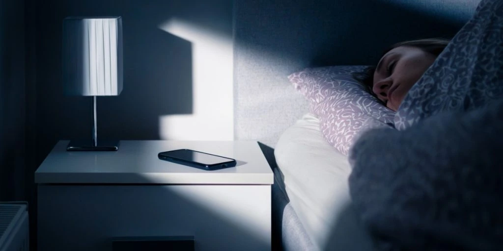 phone on bedside table