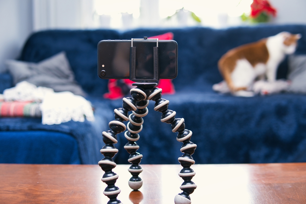 Modern,Smartphone,Mounted,At,Flexible,Tripod