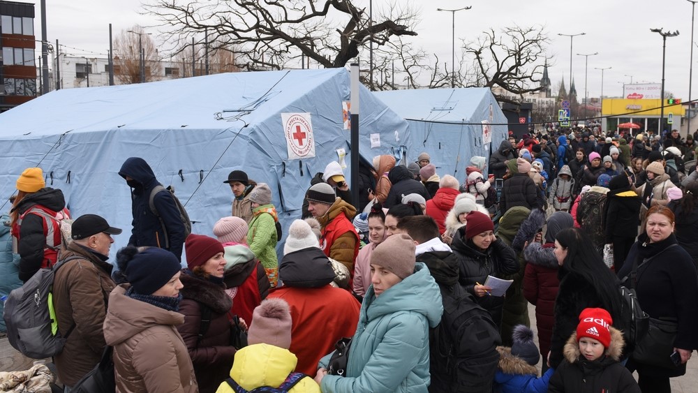 Evacuees from eastern Ukraine near the railway station in western Ukrainian city of Lviv.