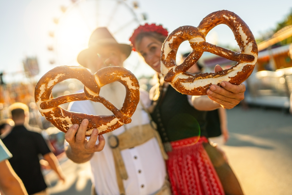 Two,People,At,Oktoberfest,Or,Dult,In,Munich,,Holding,Large