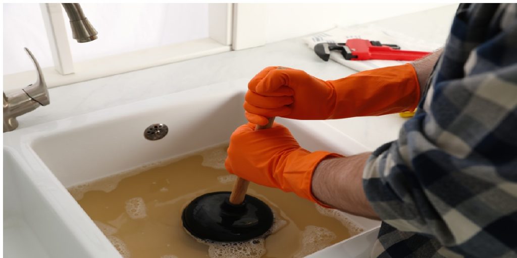 sink clogged man