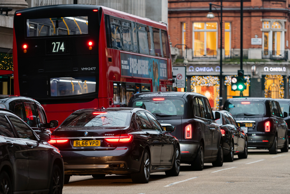 Traffic jam in London center with Taxi cars and red double decker busses, trafik, kø, bus, taxi