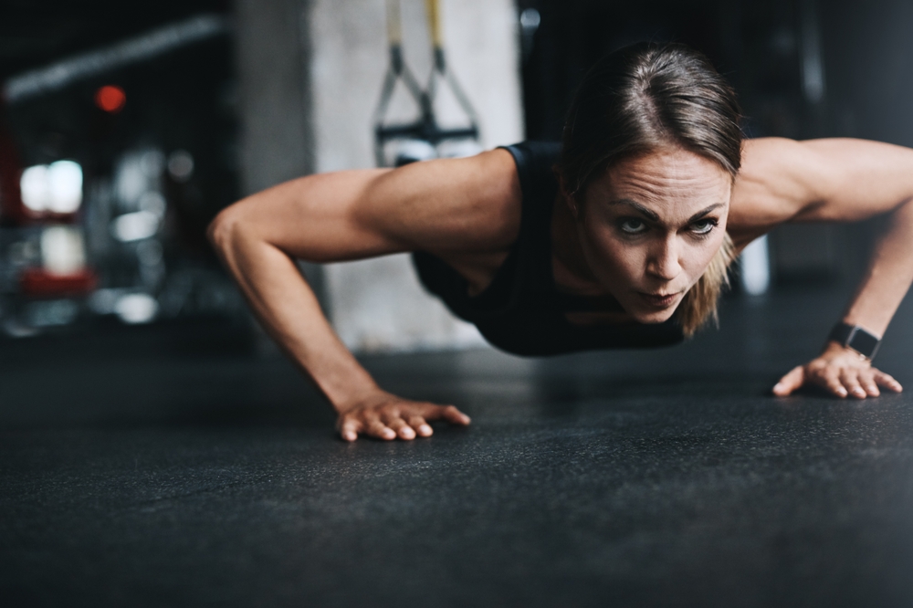 Push,Ups,,Girl,And,Fitness,In,Gym,On,Ground,For