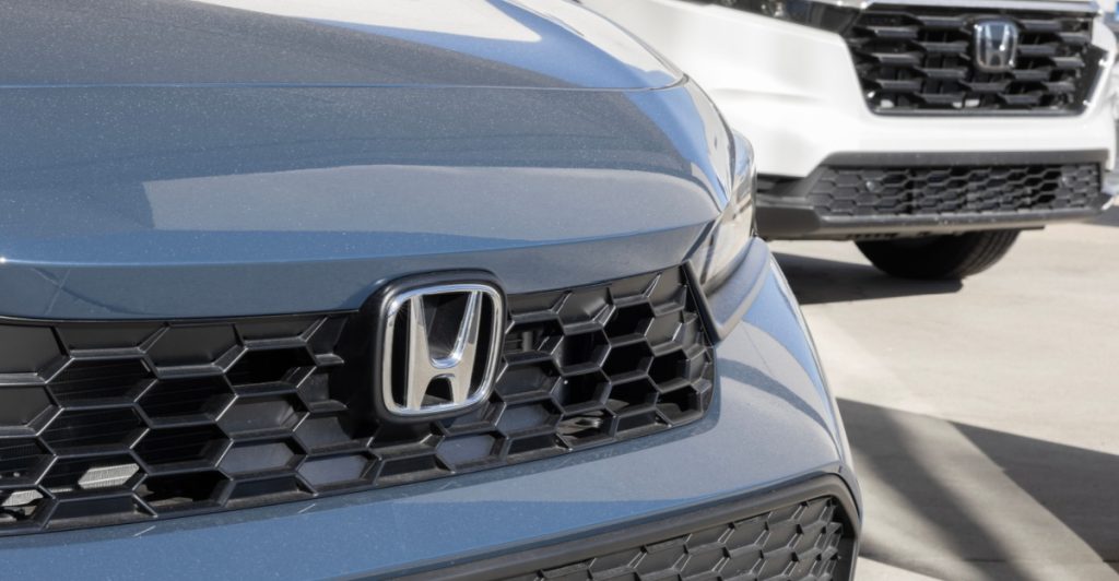 Honda edges toward normal output as chip strain eases