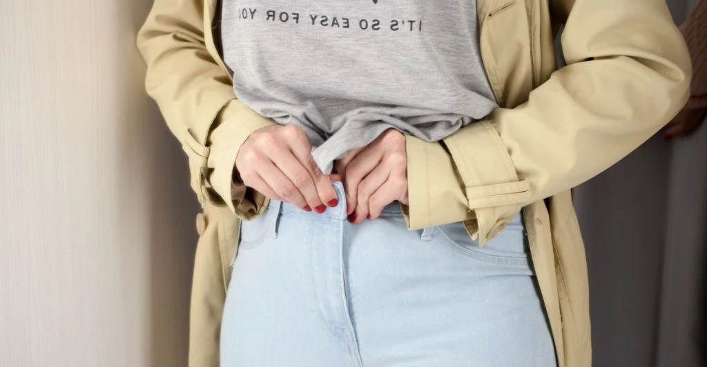Trying on jeans